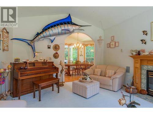 2718 Osachoff Road, South Slocan, BC - Indoor Photo Showing Living Room With Fireplace