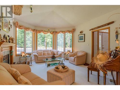 2718 Osachoff Road, South Slocan, BC - Indoor Photo Showing Living Room With Fireplace