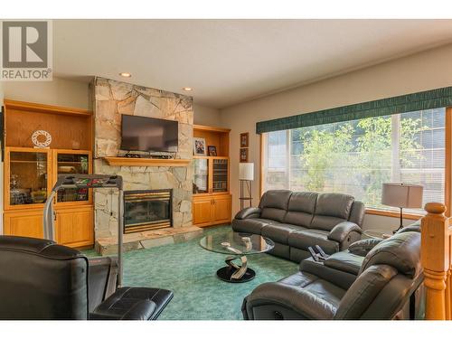 2718 Osachoff Road, South Slocan, BC - Indoor Photo Showing Living Room With Fireplace