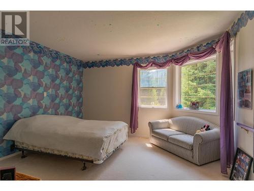 2718 Osachoff Road, South Slocan, BC - Indoor Photo Showing Bedroom