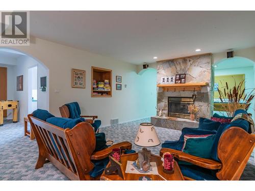 2718 Osachoff Road, South Slocan, BC - Indoor Photo Showing Living Room With Fireplace