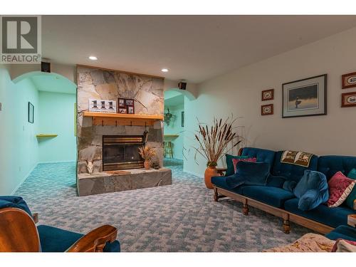 2718 Osachoff Road, South Slocan, BC - Indoor Photo Showing Living Room With Fireplace