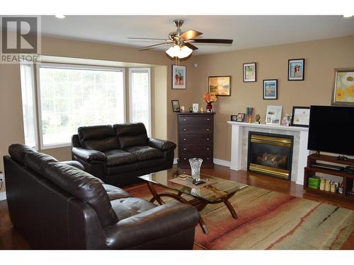 255 Redden Road, Quesnel, BC - Indoor Photo Showing Living Room With Fireplace