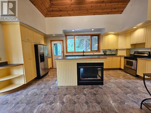 4850 East Arras Road, Dawson Creek, BC - Indoor Photo Showing Other Room With Fireplace