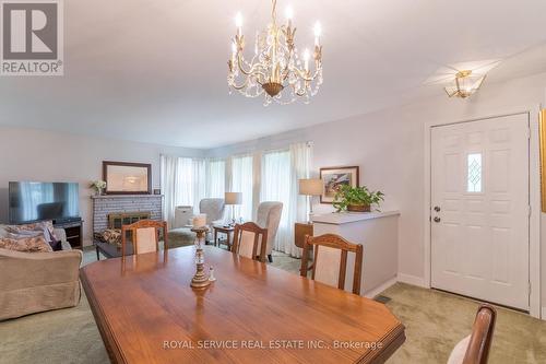 830 Kildare Road, Peterborough (Monaghan), ON - Indoor Photo Showing Dining Room With Fireplace