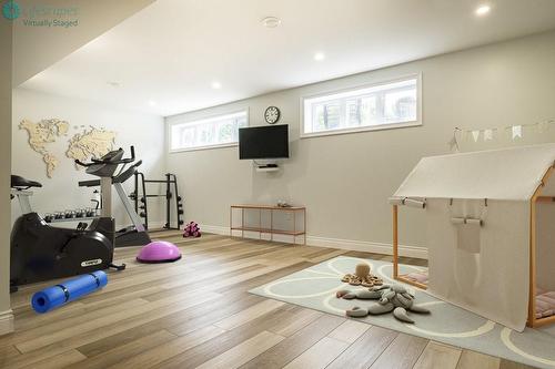 Virtually Staged gym - 175 Oakhill Place, Hamilton, ON - Indoor Photo Showing Gym Room