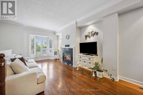 6 - 36 Mendota Road, Toronto (Stonegate-Queensway), ON - Indoor Photo Showing Living Room With Fireplace