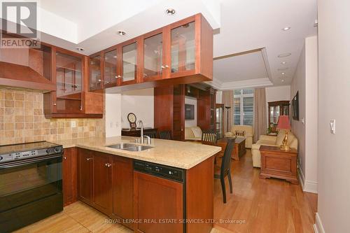 301 - 10 Bellair Street, Toronto, ON - Indoor Photo Showing Kitchen With Double Sink