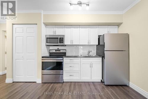 14 - 60 Laguna Parkway, Ramara (Brechin), ON - Indoor Photo Showing Kitchen