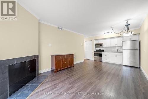 14 - 60 Laguna Parkway, Ramara (Brechin), ON - Indoor With Fireplace