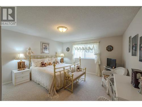 8728 Milne Road, Summerland, BC - Indoor Photo Showing Bedroom