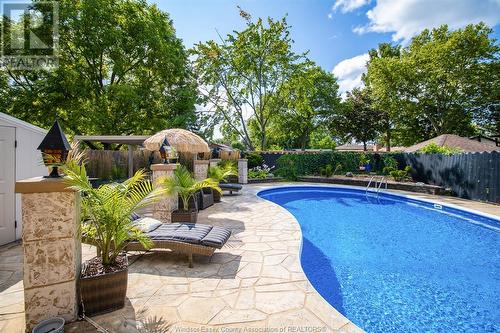 10690 Keating Crescent, Windsor, ON - Outdoor With In Ground Pool With Backyard