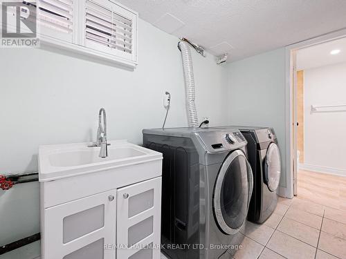 56 Secroft Crescent, Toronto (Black Creek), ON - Indoor Photo Showing Laundry Room