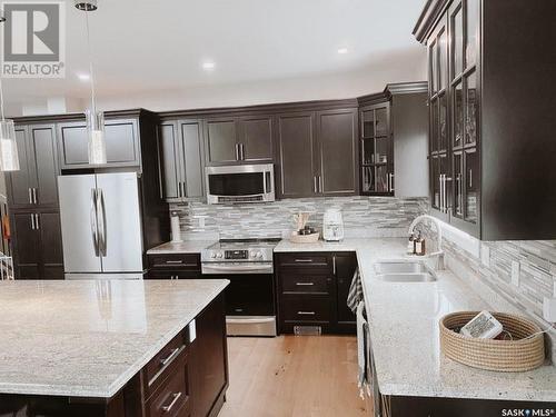 110 Hayward Drive, Carlyle, SK - Indoor Photo Showing Kitchen With Double Sink With Upgraded Kitchen