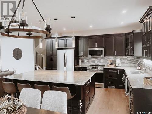 110 Hayward Drive, Carlyle, SK - Indoor Photo Showing Kitchen With Double Sink With Upgraded Kitchen