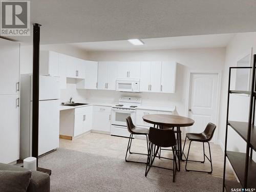 110 Hayward Drive, Carlyle, SK - Indoor Photo Showing Kitchen With Double Sink