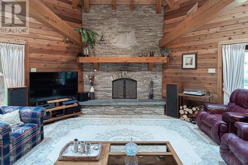 45 Atkins (Burnt Island) Road, Conception Bay South, NL - Indoor Photo Showing Living Room With Fireplace