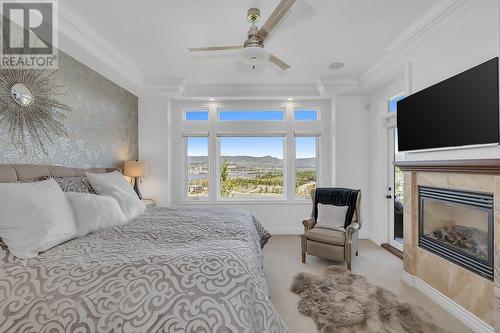 1805 Scott Crescent, West Kelowna, BC - Indoor Photo Showing Bedroom With Fireplace