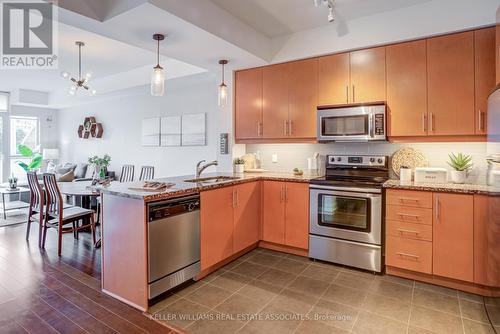 208 - 1 Hurontario Street, Mississauga (Port Credit), ON - Indoor Photo Showing Kitchen With Double Sink