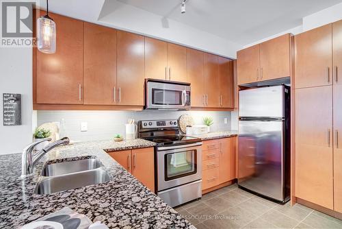 208 - 1 Hurontario Street, Mississauga (Port Credit), ON - Indoor Photo Showing Kitchen With Double Sink