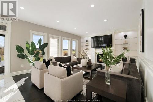 4098 St. Francis Crescent, Lasalle, ON - Indoor Photo Showing Living Room With Fireplace