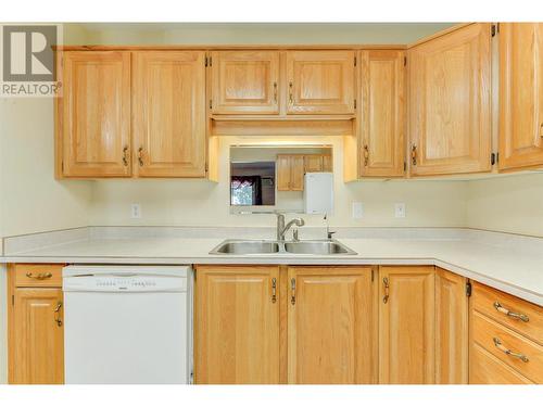 200 Hollywood Road Unit# 203, Kelowna, BC - Indoor Photo Showing Kitchen With Double Sink