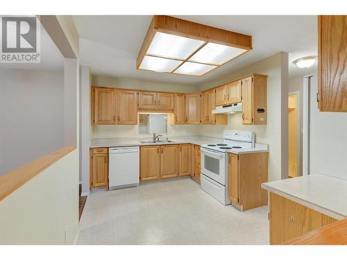 200 Hollywood Road Unit# 203, Kelowna, BC - Indoor Photo Showing Kitchen With Double Sink