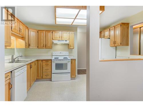 200 Hollywood Road Unit# 203, Kelowna, BC - Indoor Photo Showing Kitchen With Double Sink