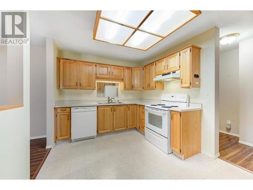 200 Hollywood Road Unit# 203, Kelowna, BC - Indoor Photo Showing Kitchen With Double Sink