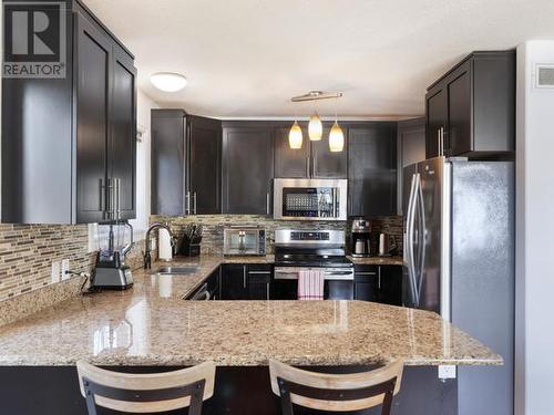 136 Goldeneye Street, Whitehorse, YT - Indoor Photo Showing Kitchen With Upgraded Kitchen