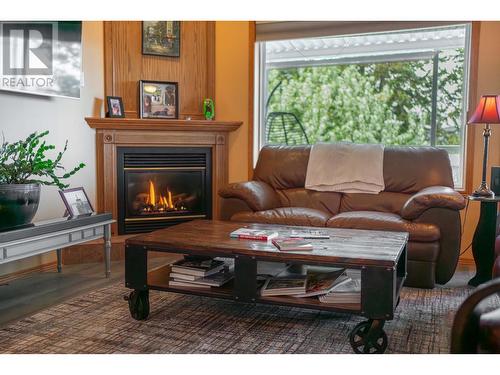 3329 Mt Fisher  Drive, Cranbrook, BC - Indoor Photo Showing Living Room With Fireplace