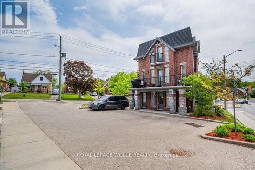 A - 489 East Avenue, Kitchener, ON - Outdoor With Facade