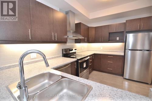 281 - 30 Times Square Boulevard, Hamilton (Stoney Creek), ON - Indoor Photo Showing Kitchen With Stainless Steel Kitchen With Double Sink