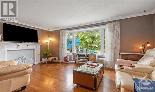 26 Melanie Crescent, Ottawa, ON - Indoor Photo Showing Living Room With Fireplace