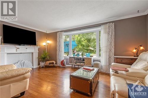 26 Melanie Crescent, Ottawa, ON - Indoor Photo Showing Living Room With Fireplace