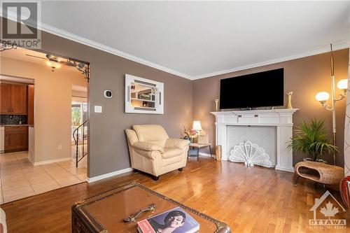 26 Melanie Crescent, Ottawa, ON - Indoor Photo Showing Living Room With Fireplace