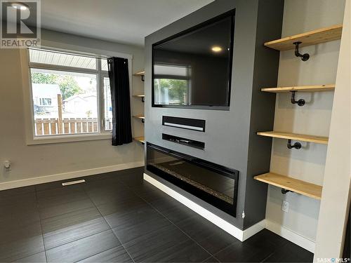 306 Torbay Street, Torquay, SK - Indoor Photo Showing Other Room With Fireplace