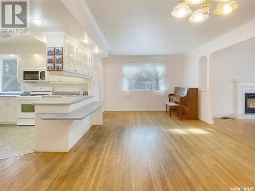 828 Temperance Street, Saskatoon, SK - Indoor Photo Showing Kitchen With Fireplace