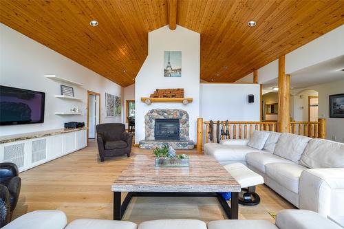 10 Candide Drive, Lumby, BC - Indoor Photo Showing Living Room With Fireplace