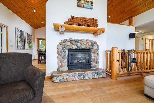 10 Candide Drive, Lumby, BC - Indoor Photo Showing Living Room With Fireplace