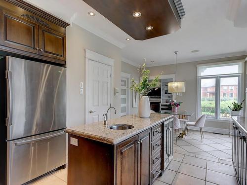 Cuisine - 7630 Rue De Liverpool, Brossard, QC - Indoor Photo Showing Kitchen With Upgraded Kitchen