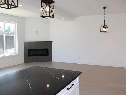 4369 Bains Mill Rd, Duncan, BC - Indoor Photo Showing Living Room With Fireplace