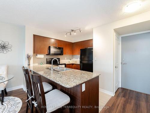 503-80 Esther Lorrie Dr, Toronto, ON - Indoor Photo Showing Kitchen With Double Sink