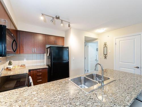 503-80 Esther Lorrie Dr, Toronto, ON - Indoor Photo Showing Kitchen With Double Sink