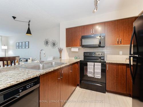 503-80 Esther Lorrie Dr, Toronto, ON - Indoor Photo Showing Kitchen With Double Sink