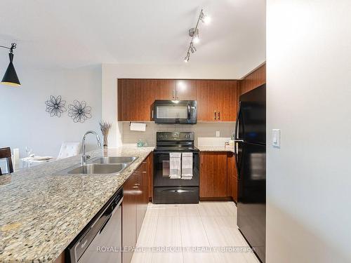 503-80 Esther Lorrie Dr, Toronto, ON - Indoor Photo Showing Kitchen With Double Sink