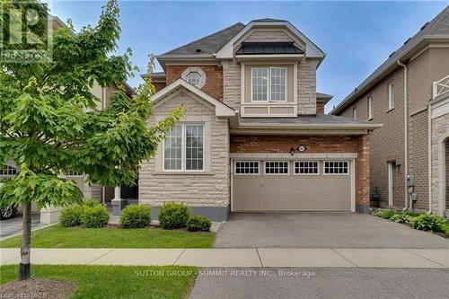 463 Etheridge Avenue, Milton (Ford), ON - Outdoor With Facade