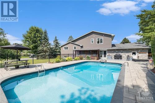 2384 Lenida Drive, Ottawa, ON - Outdoor With In Ground Pool With Backyard