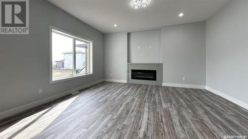 755 Delainey Court, Saskatoon, SK - Indoor With Fireplace