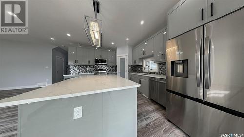 755 Delainey Court, Saskatoon, SK - Indoor Photo Showing Kitchen With Upgraded Kitchen